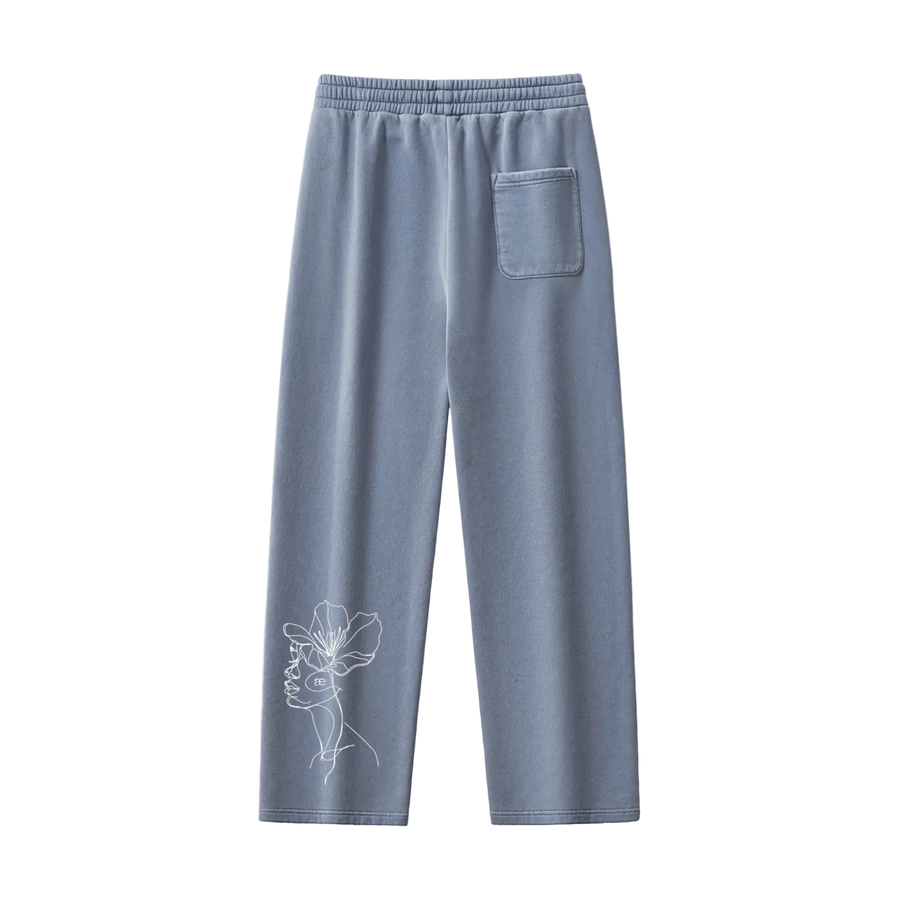 Light blue sweatpants with a white floral design